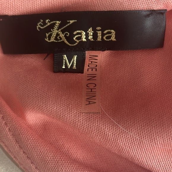 Katia Dress with pleats and cutouts - Picture 14 of 15